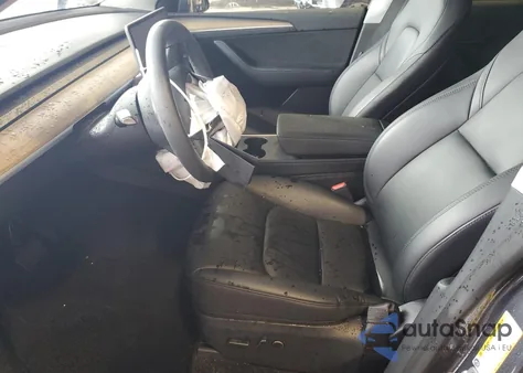 2023 Tesla Model Y z USA, uszkodzony, nr VIN 7SAYGDEE6PA053033